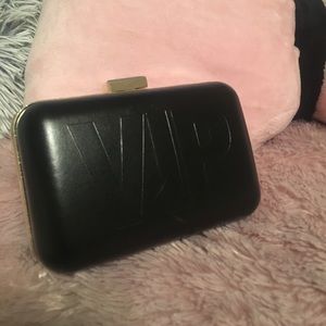212 VIP Carolina Herrera mini clutch